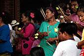 Ayutthaya, Thailand. Wat Yai Chai Mongkhon. When praying Thai people take three incense sticks for Buddha, Sangha and Dharma, a lotus and a small candle which symbolizes the Buddhist teachings purity, comprehension and enlightenment. 